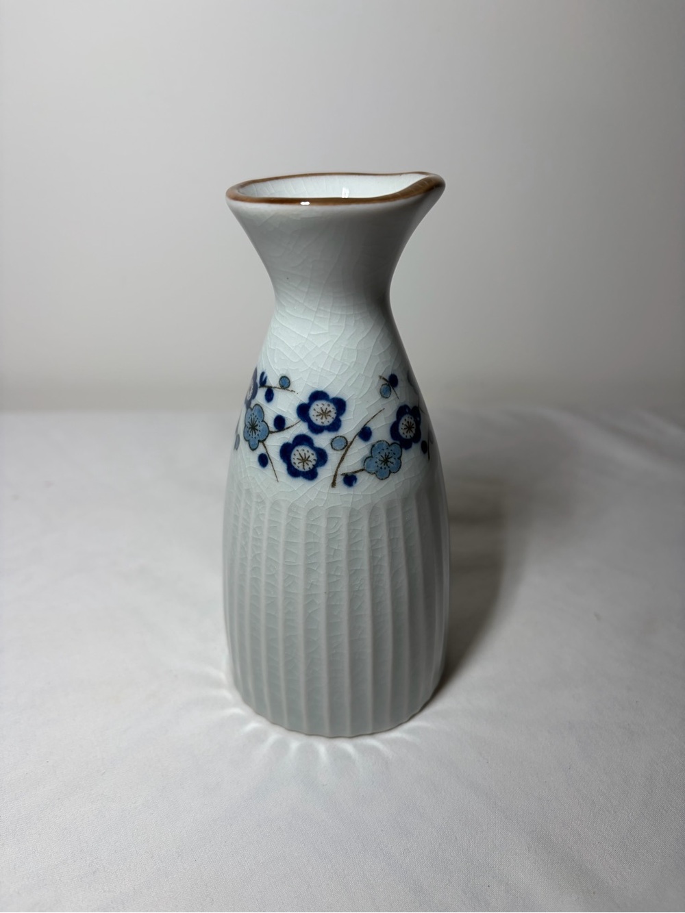 White Ceramic Floral Vase with Blue Blossom Accent